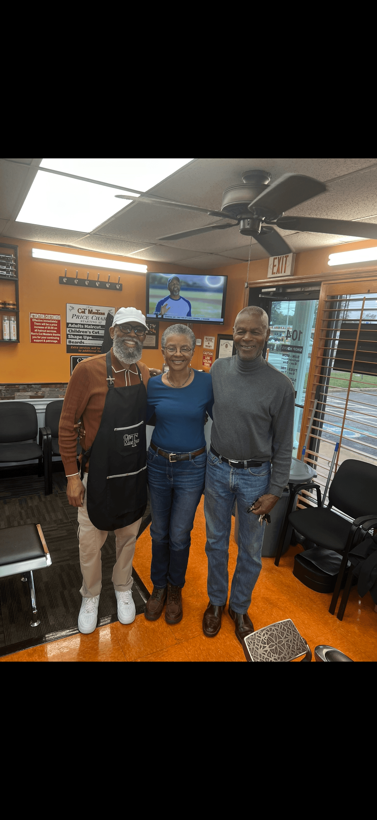 Ron's Cut Masters neighborhood family photo